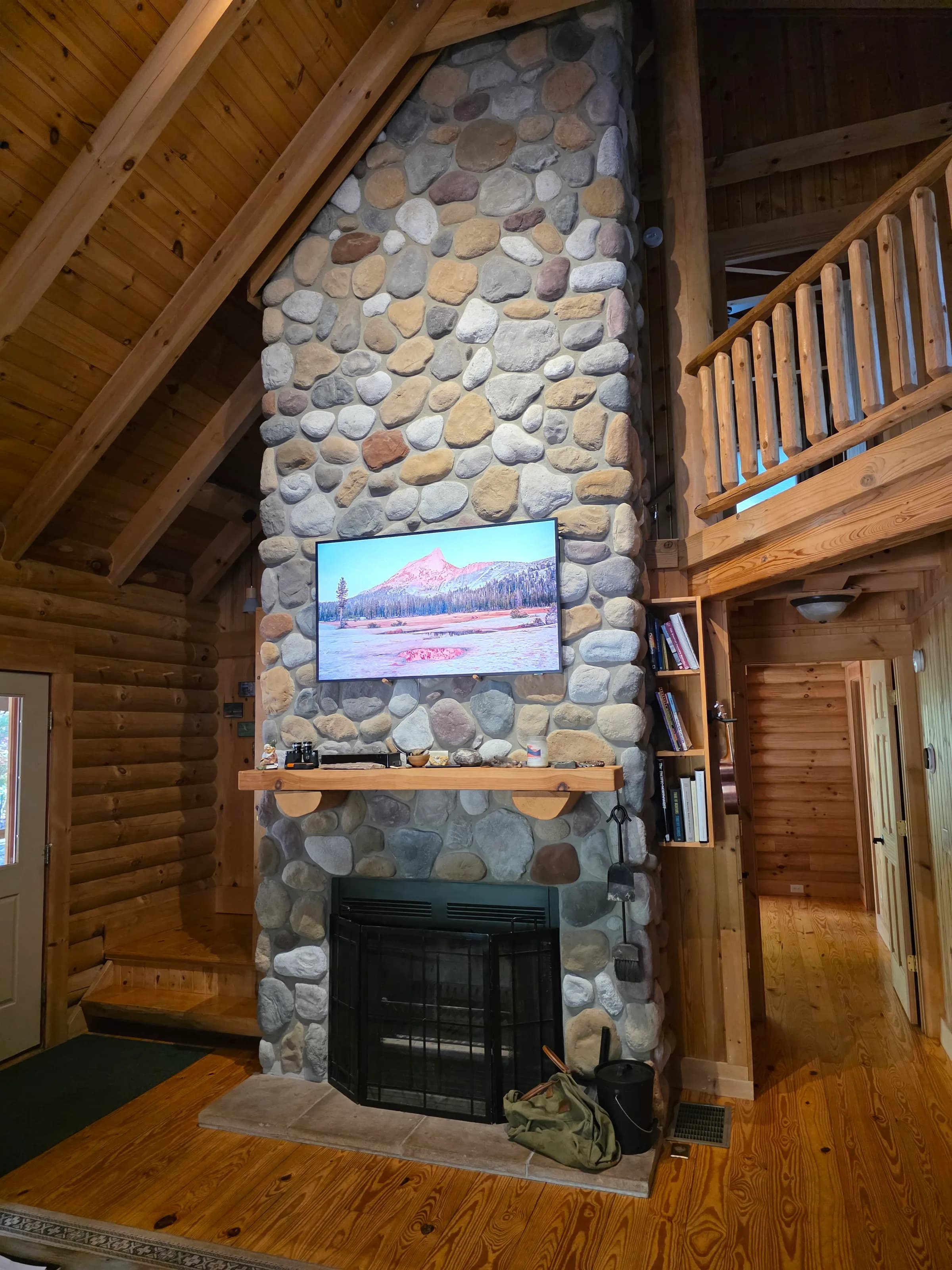 River-stone fireplace and lofted ceilings