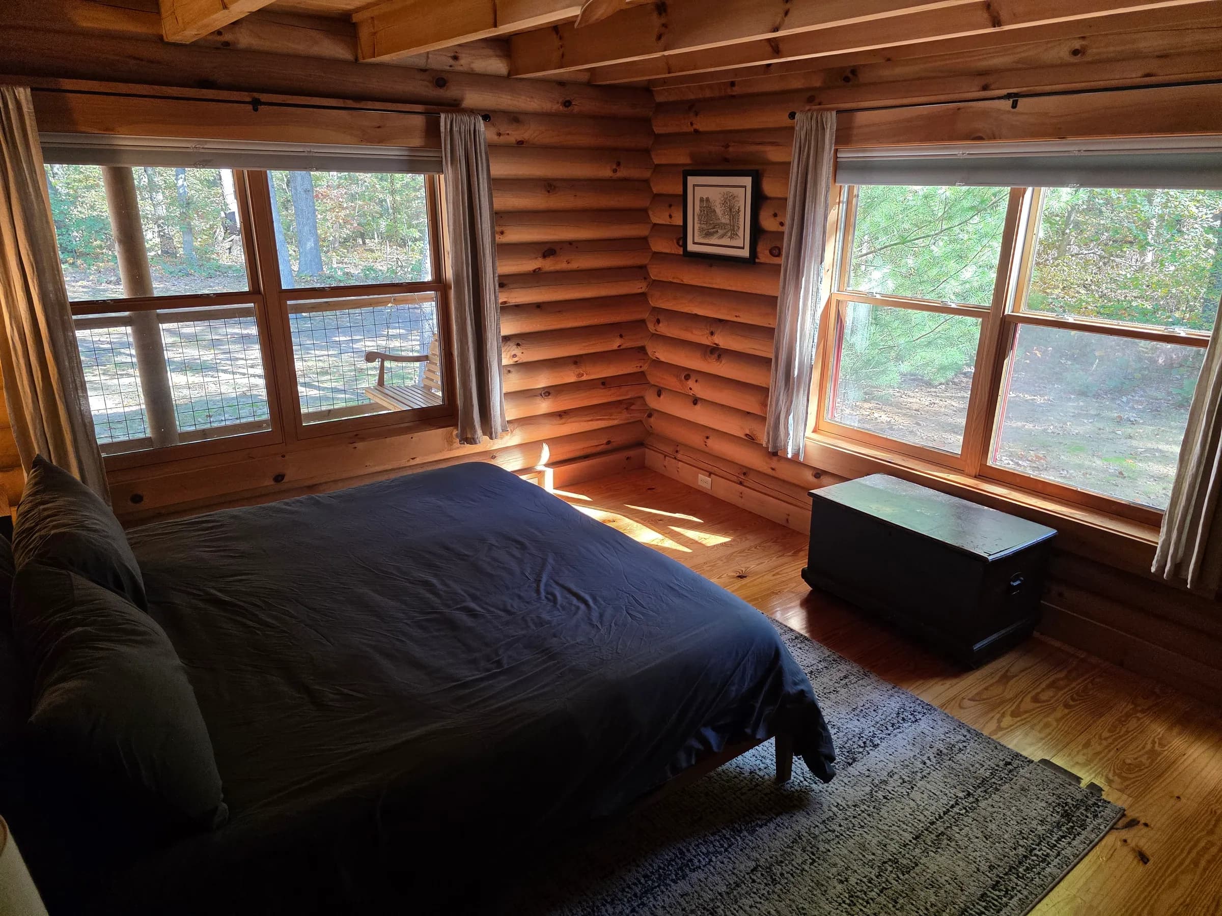 Bedroom with forest views
