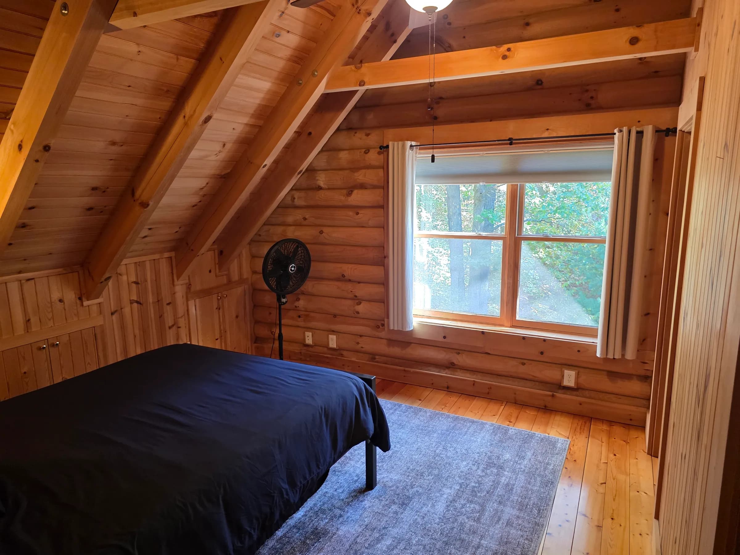 Loft bedroom under the beams