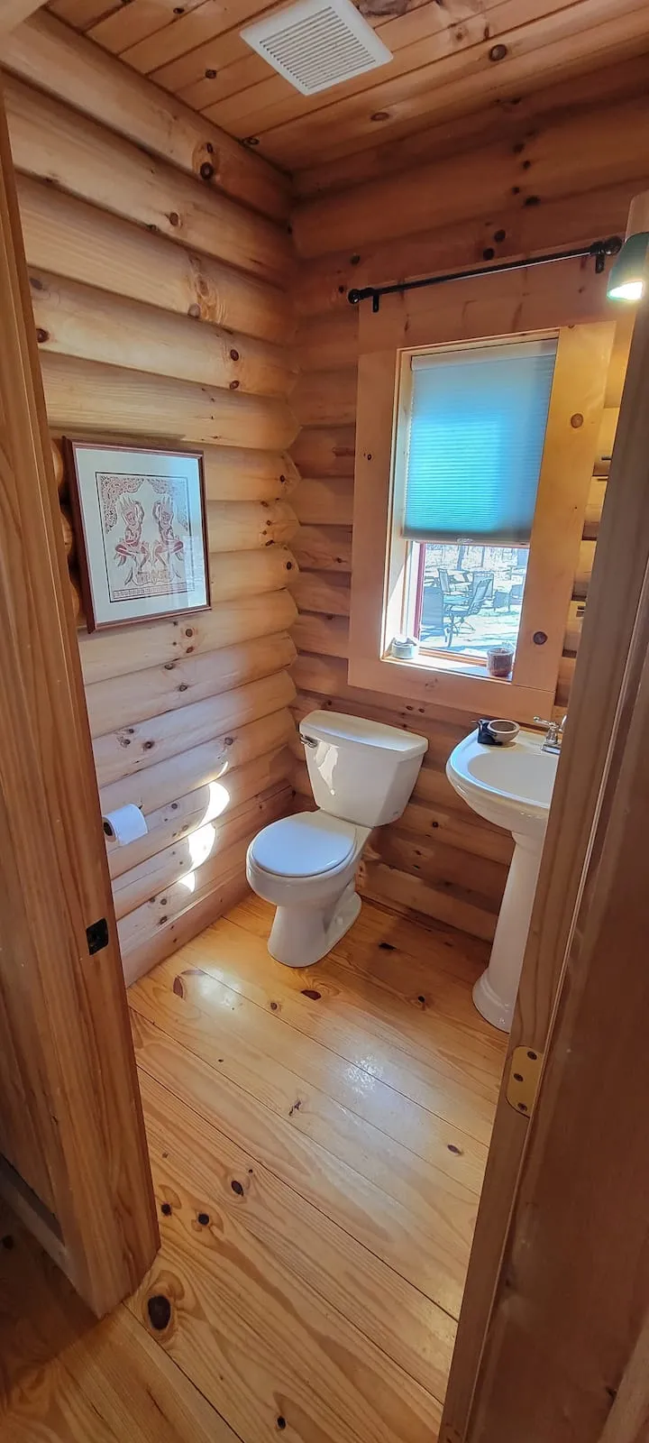 Log-walled half bath