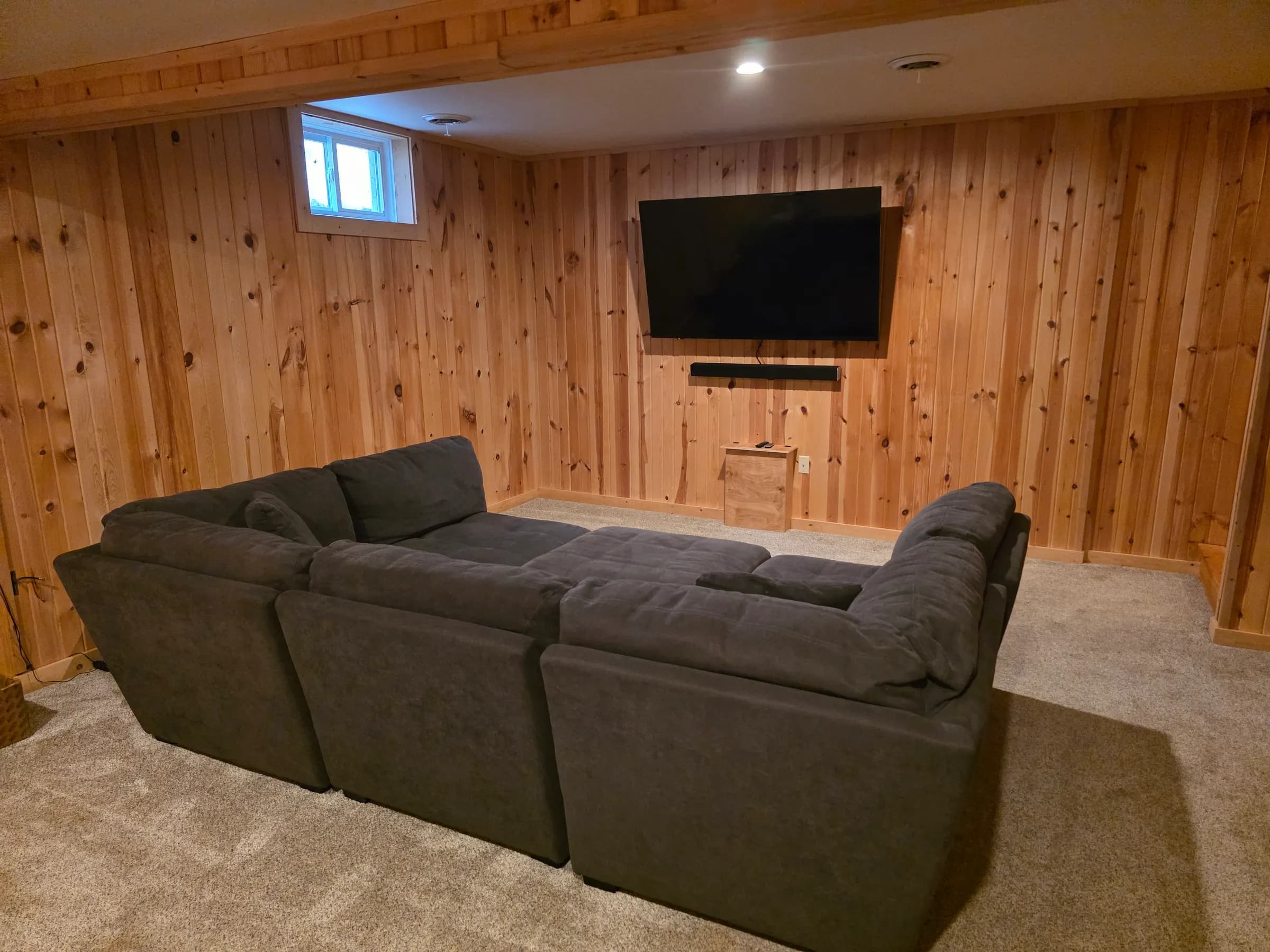 Lower-level family room with big TV