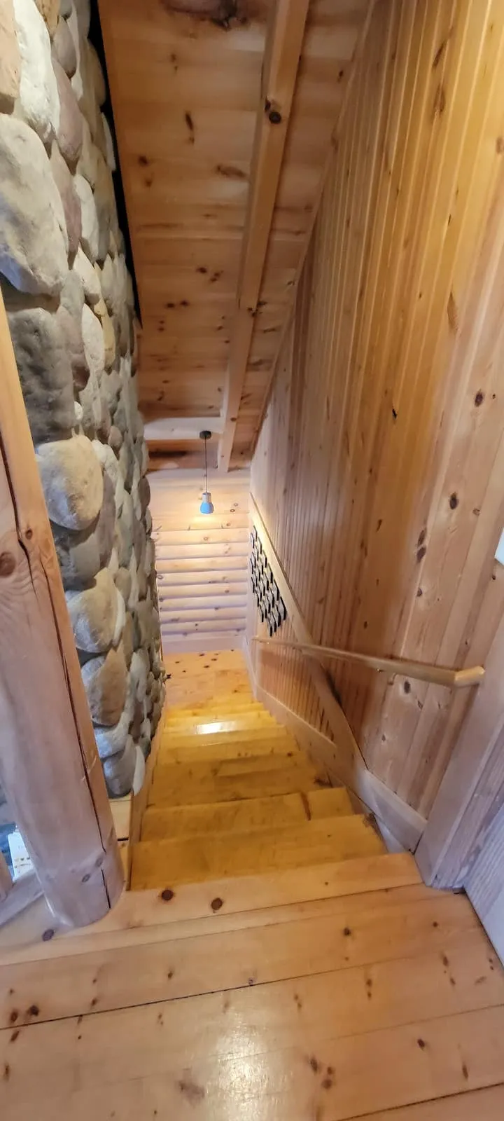 Stairs beside the stone chimney