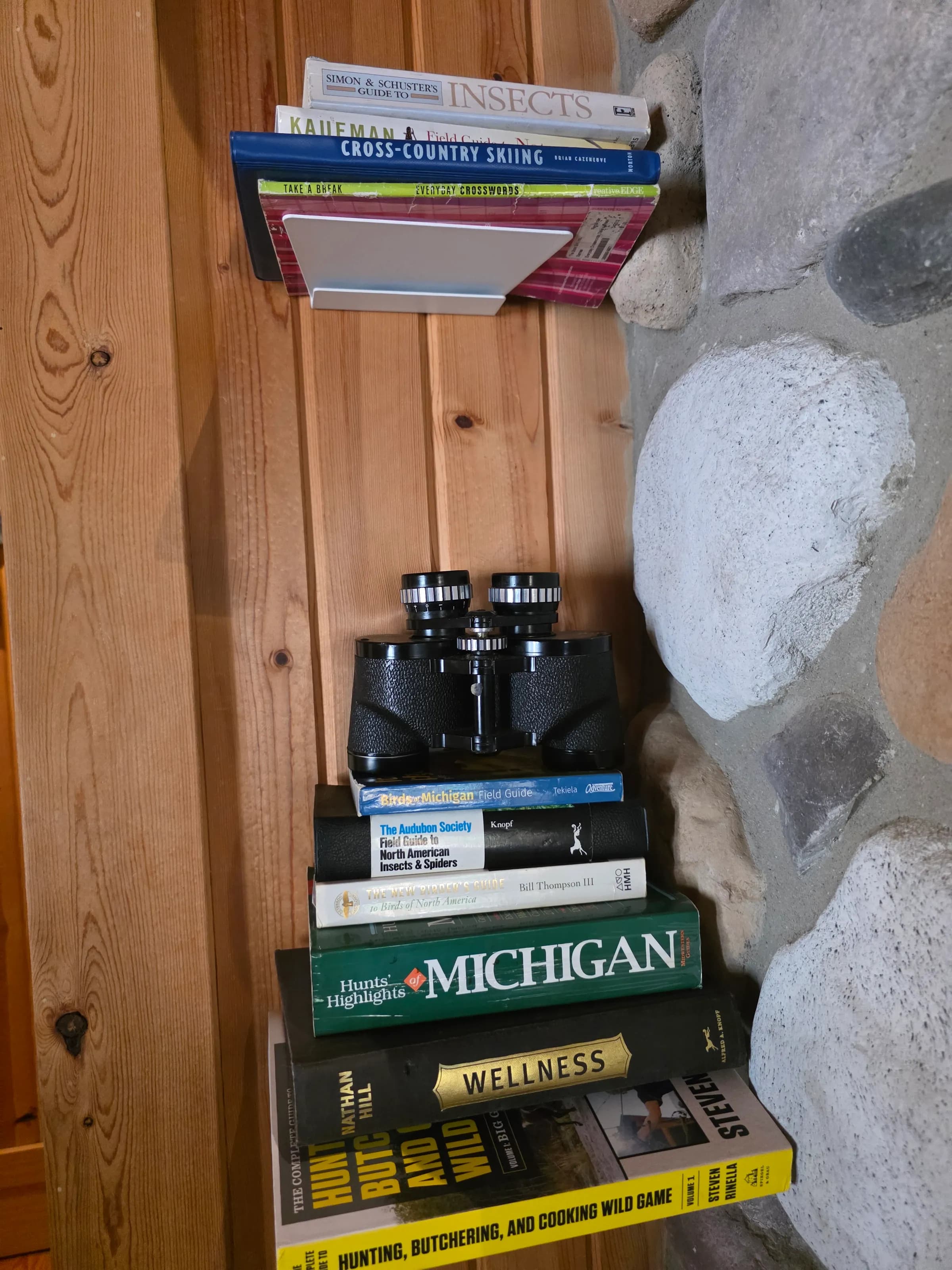 Binoculars and field guides for birdwatching