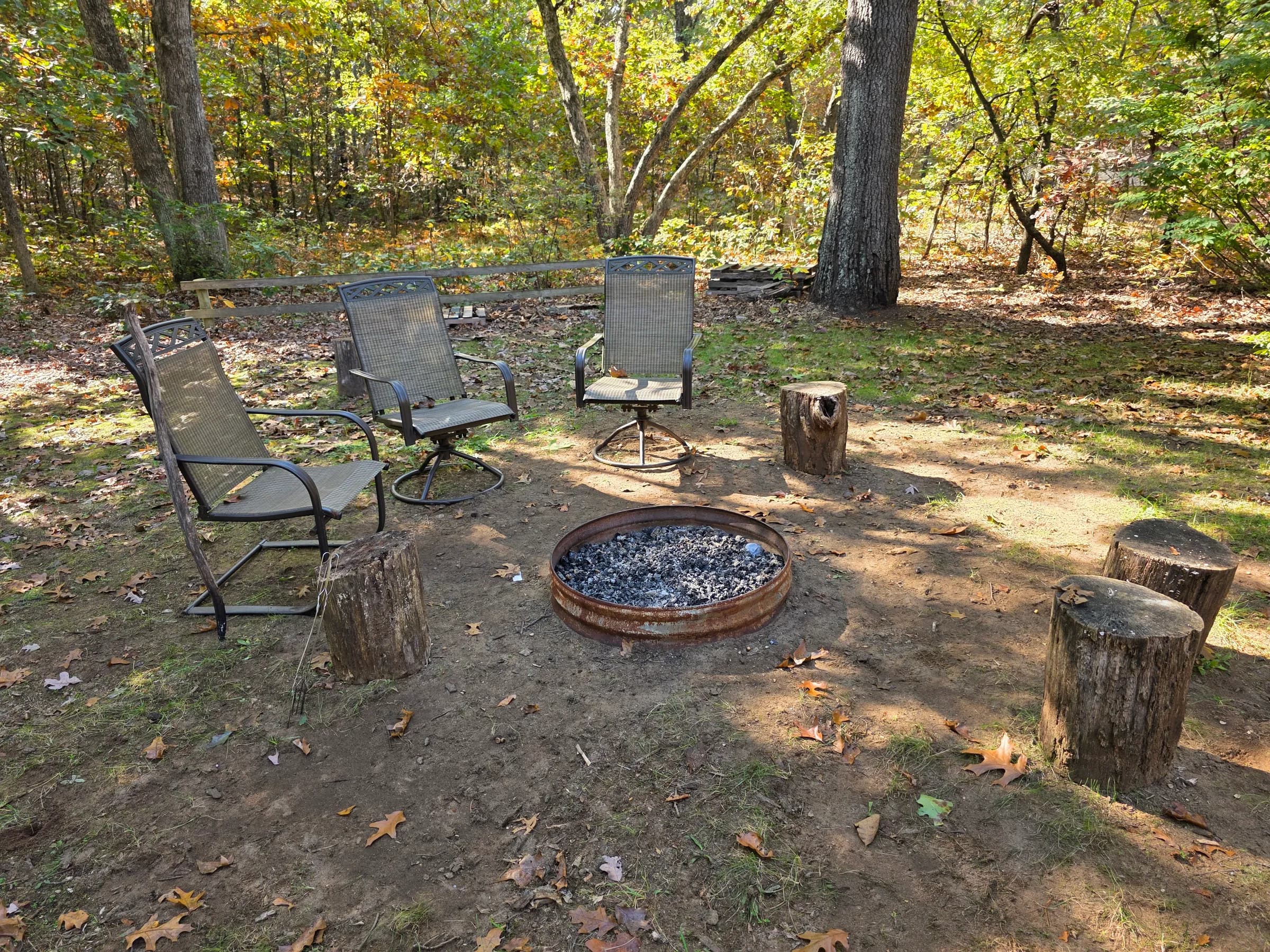 Fire pit circle with swivel chairs